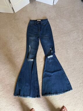 High-Rise Dark Blue Distressed Flare Jeans